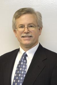 Dr. Larry R. White