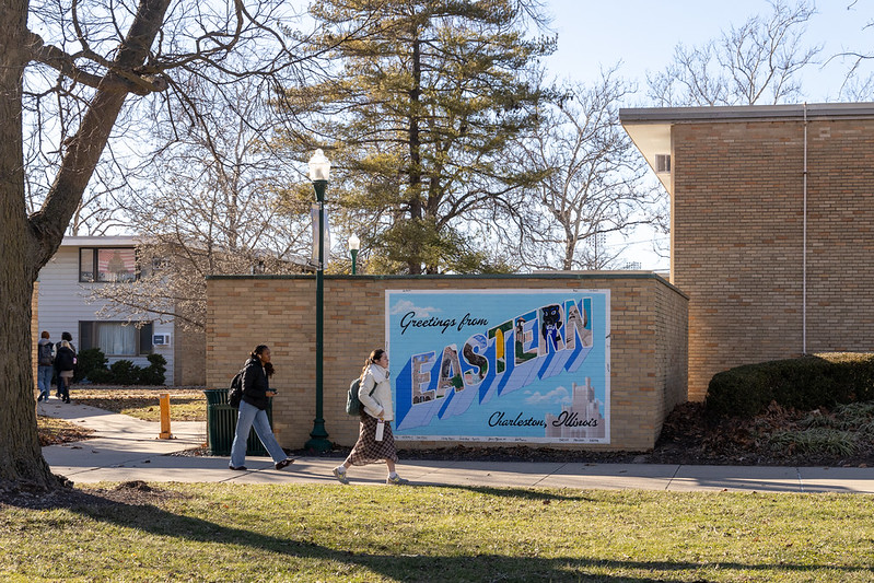 students walking across campus