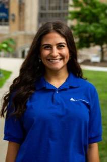 sloane head shot in EIU polo
