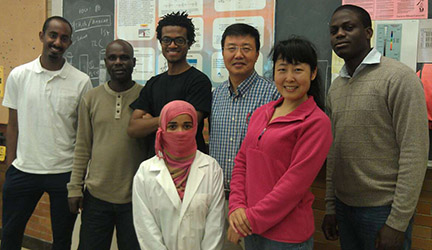 Dr. He with EIU students