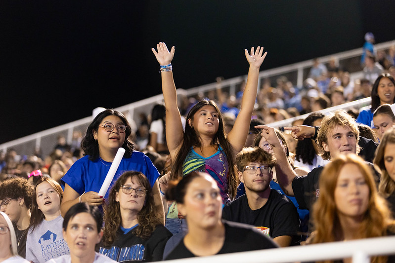 student at football game
