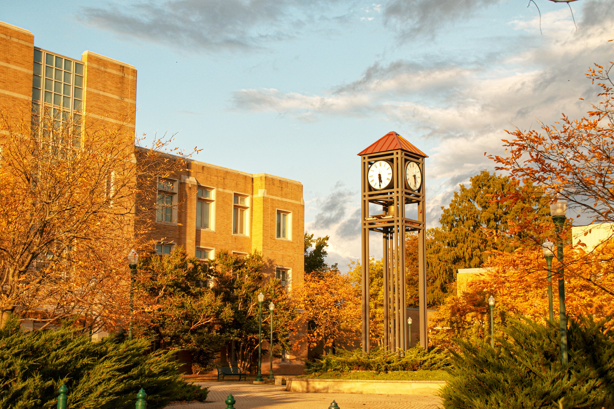 alumni clock tower at sunset