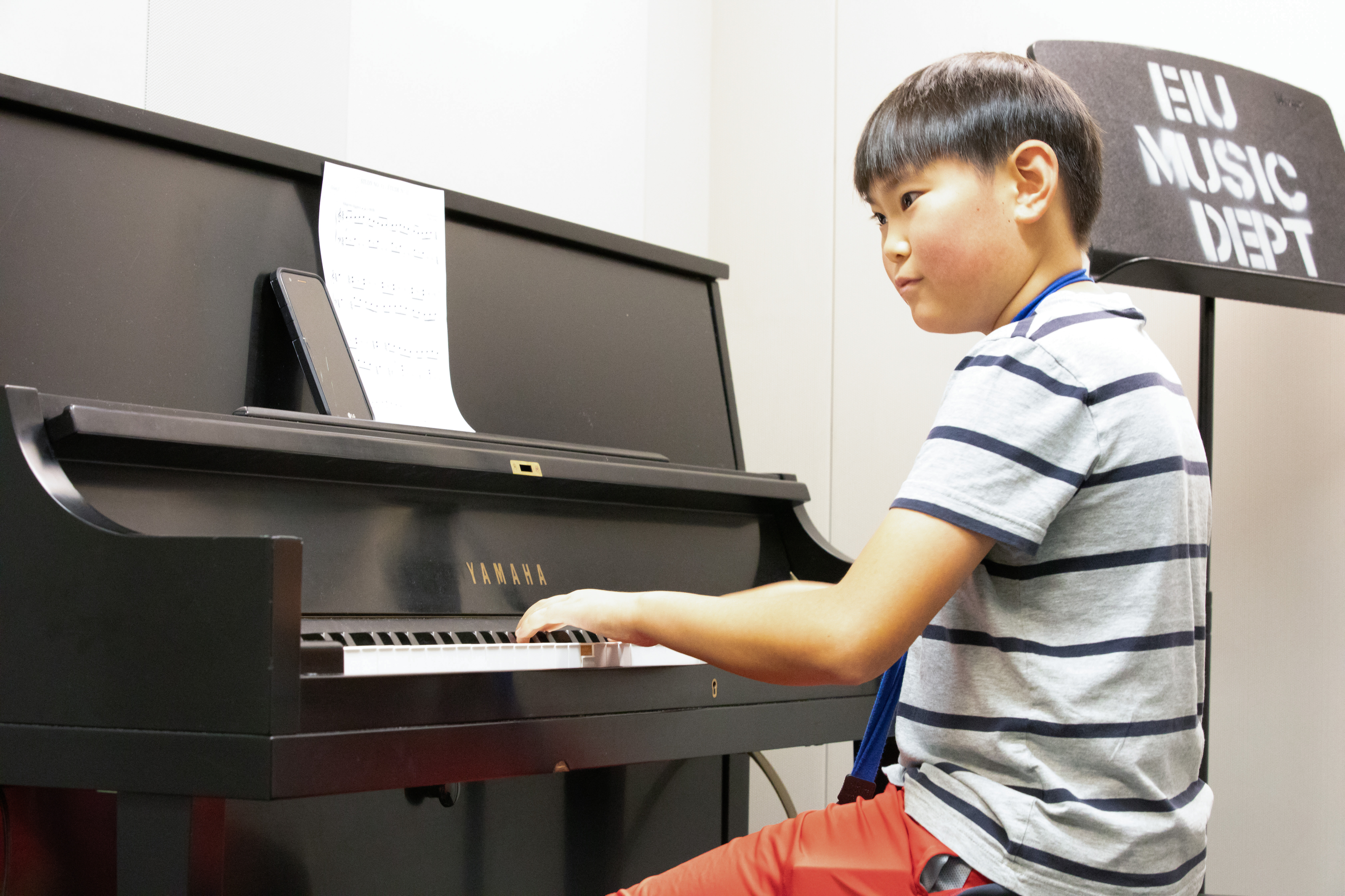Piano kid practicing