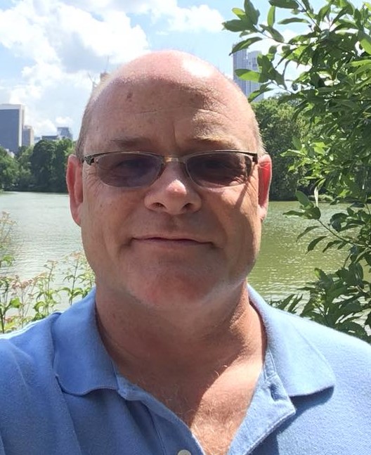 Jeff Ashley outside under a blue sky