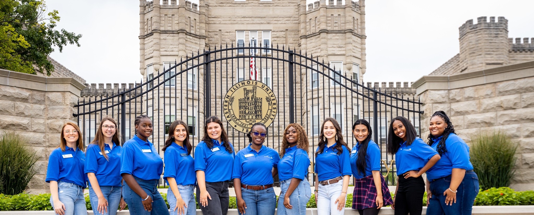 group of graduate students in front of old main